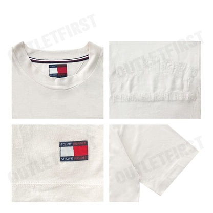 TOMMY HILFIGER รุ่น TOMMY HILFIGER X SHAWN MENDES LOGO T-SHIRT Code: MW31189 AC0 เสื้อยืด เสื้อคอกลม เสื้อผู้ชาย