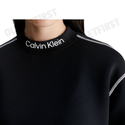 CALVIN KLEIN รุ่น  CROPPED MOCK NECK LOGO TOP CODE: 4WF3W326-001 เสื้อครอปแขนยาว เสื้อผู้หญิง เสื้อครอป