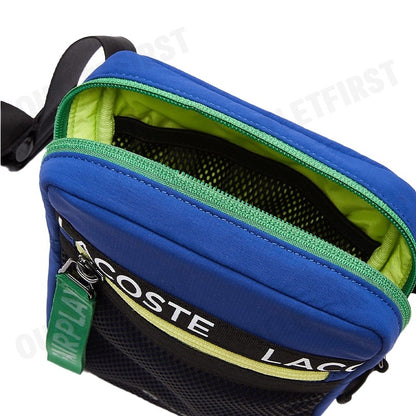 LACOSTE รุ่น  UNISEX BRANDED BAND NYLON FLAT CROSSOVER BAG CODE: NU3797UH J77 กระเป๋า กระเป๋าสะพายข้าง กระเป๋าแฟชั่น
