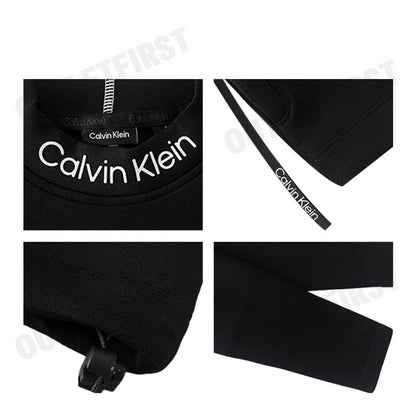 CALVIN KLEIN รุ่น  CROPPED MOCK NECK LOGO TOP CODE: 4WF3W326-001 เสื้อครอปแขนยาว เสื้อผู้หญิง เสื้อครอป