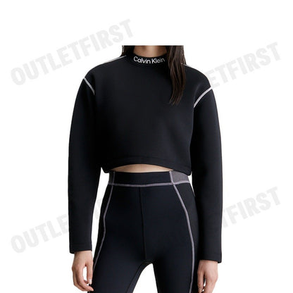 CALVIN KLEIN รุ่น  CROPPED MOCK NECK LOGO TOP CODE: 4WF3W326-001 เสื้อครอปแขนยาว เสื้อผู้หญิง เสื้อครอป
