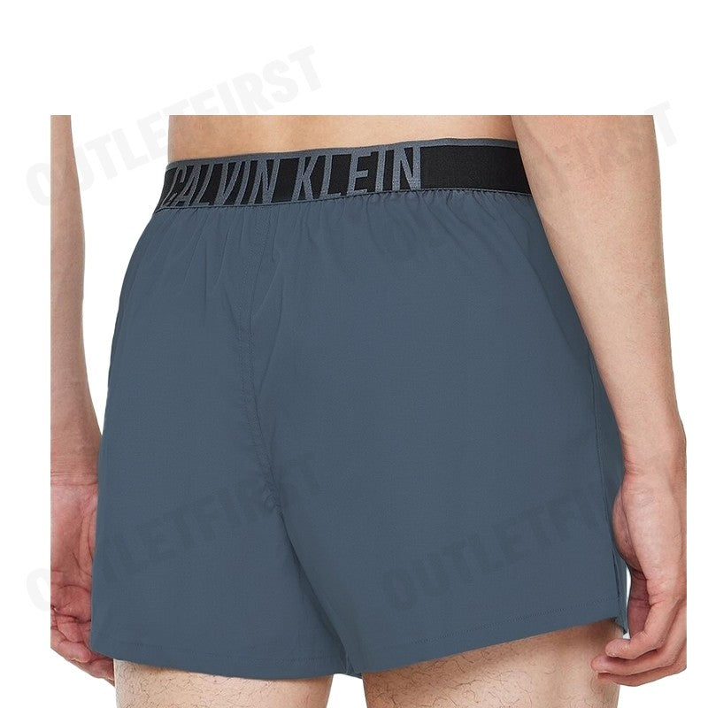 CALVIN KLEIN รุ่น SLIM BOXER COTTON STRETCH CODE: NM2573 CKP กางเกงขาสั้นผู้ชาย กางเกงใน สีคราม