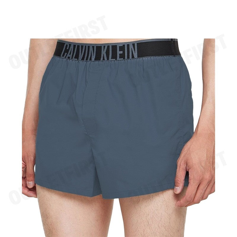 CALVIN KLEIN รุ่น SLIM BOXER COTTON STRETCH CODE: NM2573 CKP กางเกงขาสั้นผู้ชาย กางเกงใน สีคราม