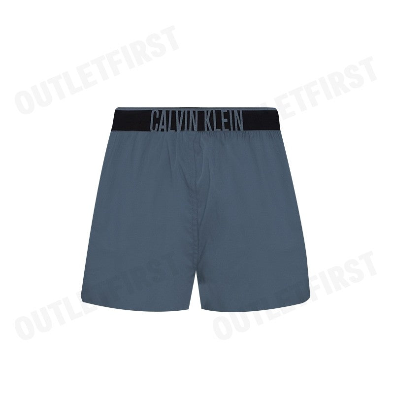 CALVIN KLEIN รุ่น SLIM BOXER COTTON STRETCH CODE: NM2573 CKP กางเกงขาสั้นผู้ชาย กางเกงใน สีคราม