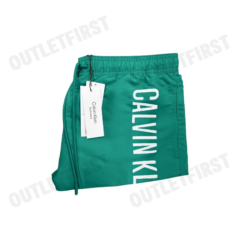 CALVIN KLEIN SWIMWEAR รุ่น MEDIUM DRAWSTRING SWIM SHORTS CODE: N61092 VFL กางเกงว่ายน้ำ กางเกงขาสั้น กางเกงผู้ชาย