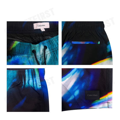 CALVIN KLEIN SWIMWEAR รุ่น MEDIUM DRAWSTRING SWIM SHORTS CODE: KM01005 0GZ กางเกงว่ายน้ำ กางเกงผู้ชาย กางเกง