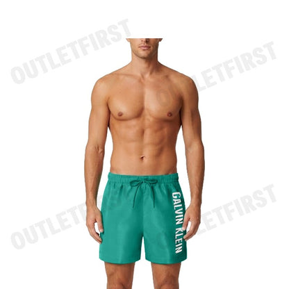 CALVIN KLEIN SWIMWEAR รุ่น MEDIUM DRAWSTRING SWIM SHORTS CODE: N61092 VFL กางเกงว่ายน้ำ กางเกงขาสั้น กางเกงผู้ชาย