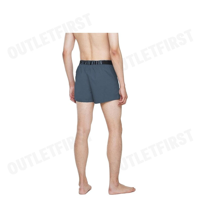 CALVIN KLEIN รุ่น SLIM BOXER COTTON STRETCH CODE: NM2573 CKP กางเกงขาสั้นผู้ชาย กางเกงใน สีคราม